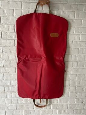 Jon Hart red garment bag
